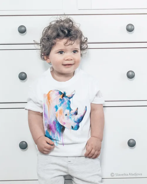 Blue rhino watercolor painting printed on a white cotton T-shirt by Slaveika Aladjova, view 2
