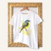 Eastern Yellow Robin watercolor painting printed on a white cotton T-shirt by Slaveika Aladjova