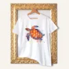Green Sea Turtle watercolor painting printed on a white cotton T-shirt by Slaveika Aladjova