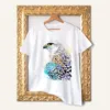 Gyrfalcon watercolor painting printed on a white cotton T-shirt by Slaveika Aladjova