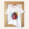 Ladybug watercolor painting printed on a white cotton T-shirt by Slaveika Aladjova