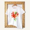 Orange Lilies watercolor painting printed on a white cotton T-shirt by Slaveika Aladjova