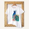 Peacock watercolor painting printed on a white cotton T-shirt by Slaveika Aladjova