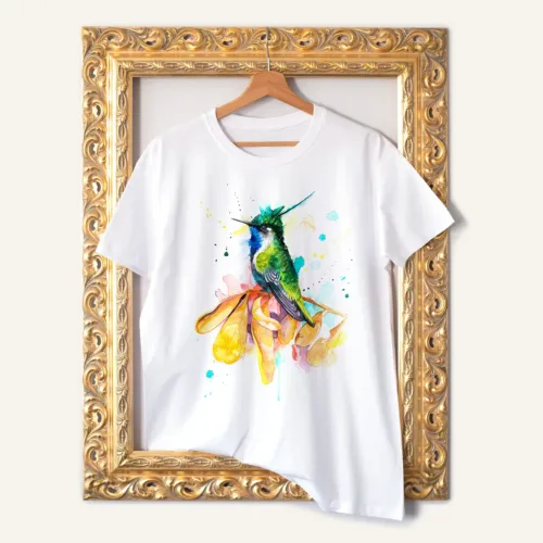 Plovercrest Hummingbird T-Shirt, Watercolor Art Tee Plovercrest Hummingbird watercolor painting printed on a white cotton T-shirt by Slaveika Aladjova
